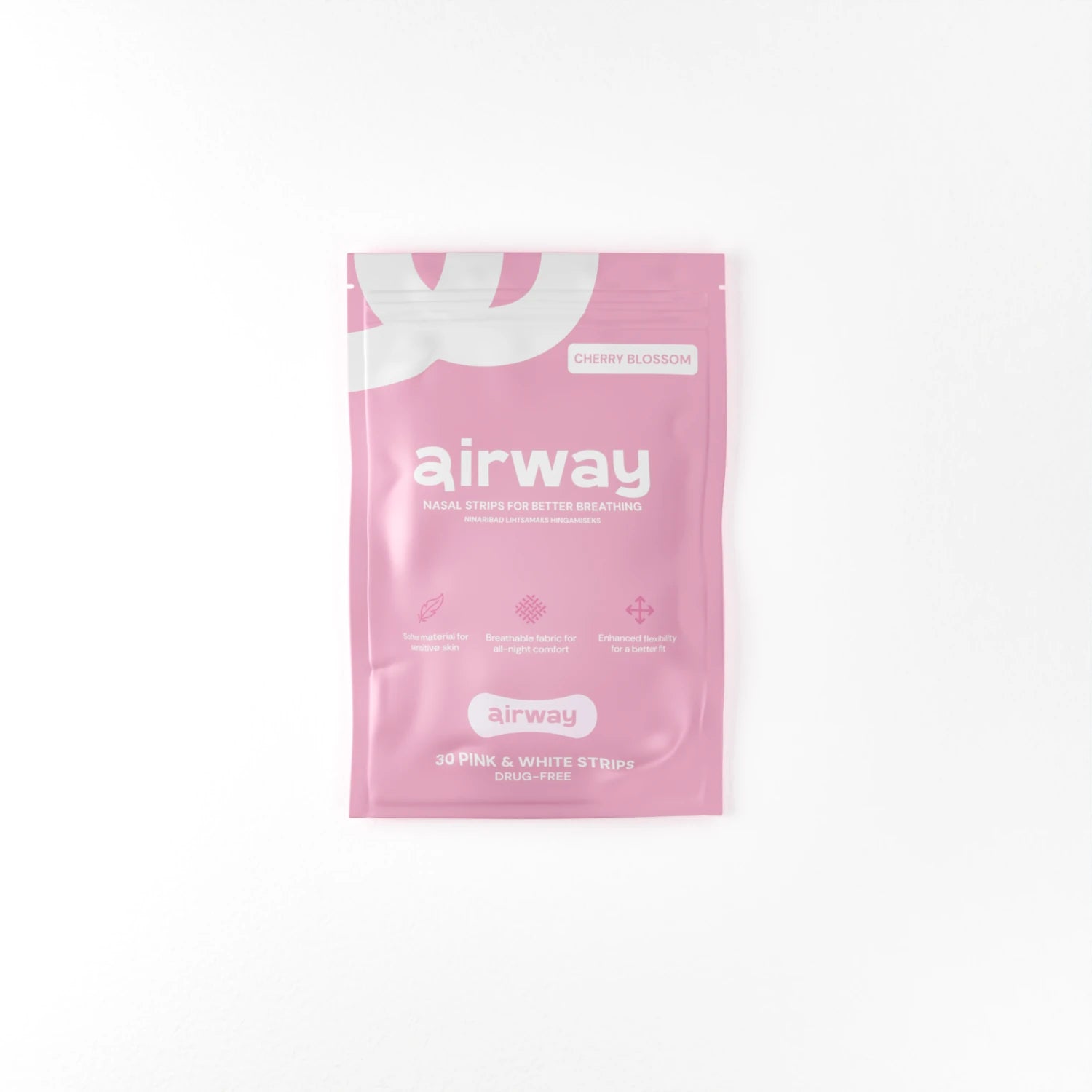 Pink package of airway nasal strip on a white background