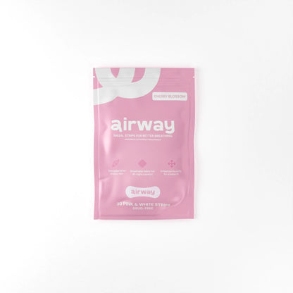 Pink package of airway nasal strip on a white background